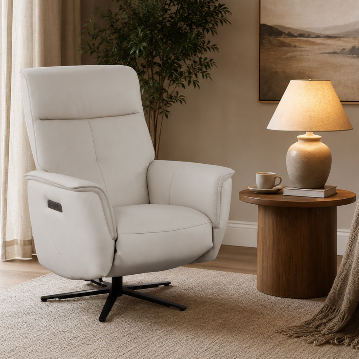 Blackwater cream recliner chair in a living room setting with a side table and lamp.