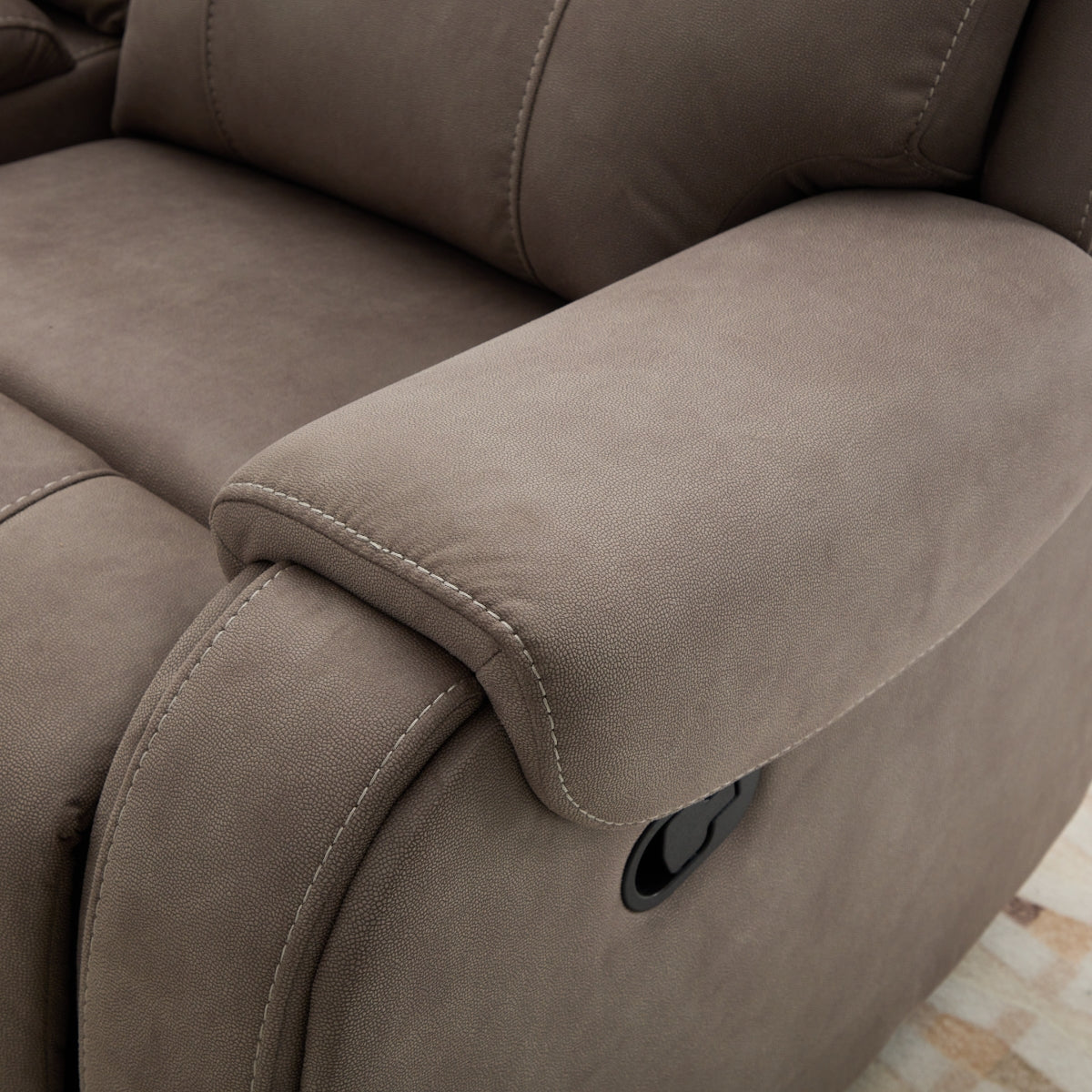 Close-up of the Hamilton grey recliner sofa with visible stitching details.