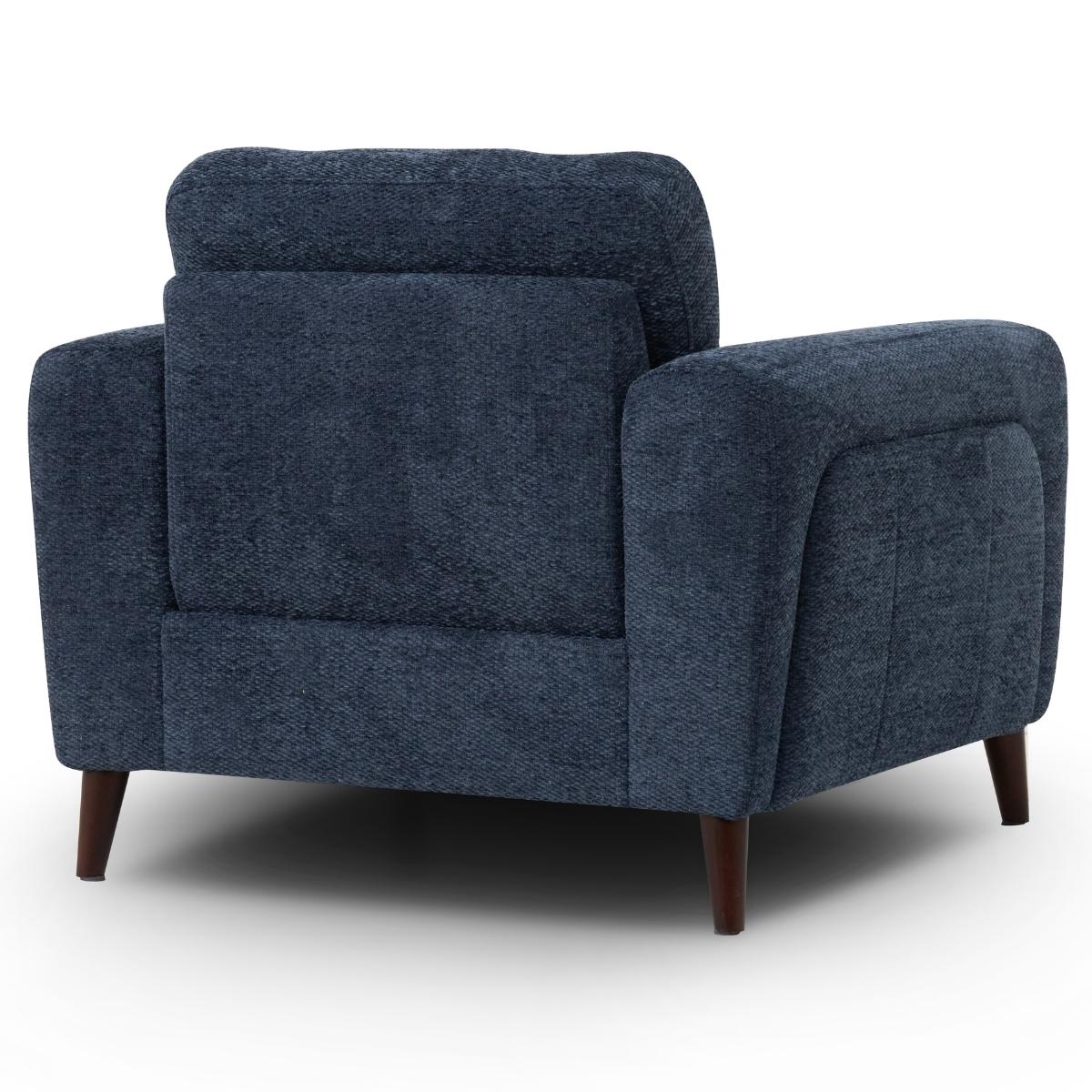 Manhattan armchair upholstered in textured navy blue fabric, featuring dark brown wooden legs, shown from a three-quarter angle against a white background.