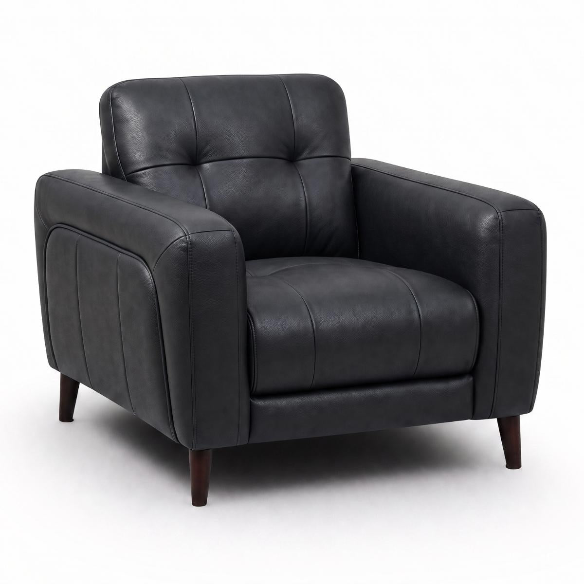 Manhattan black leather armchair with a tufted backrest, padded seat cushion, and dark wooden legs, shown on a plain white studio background.