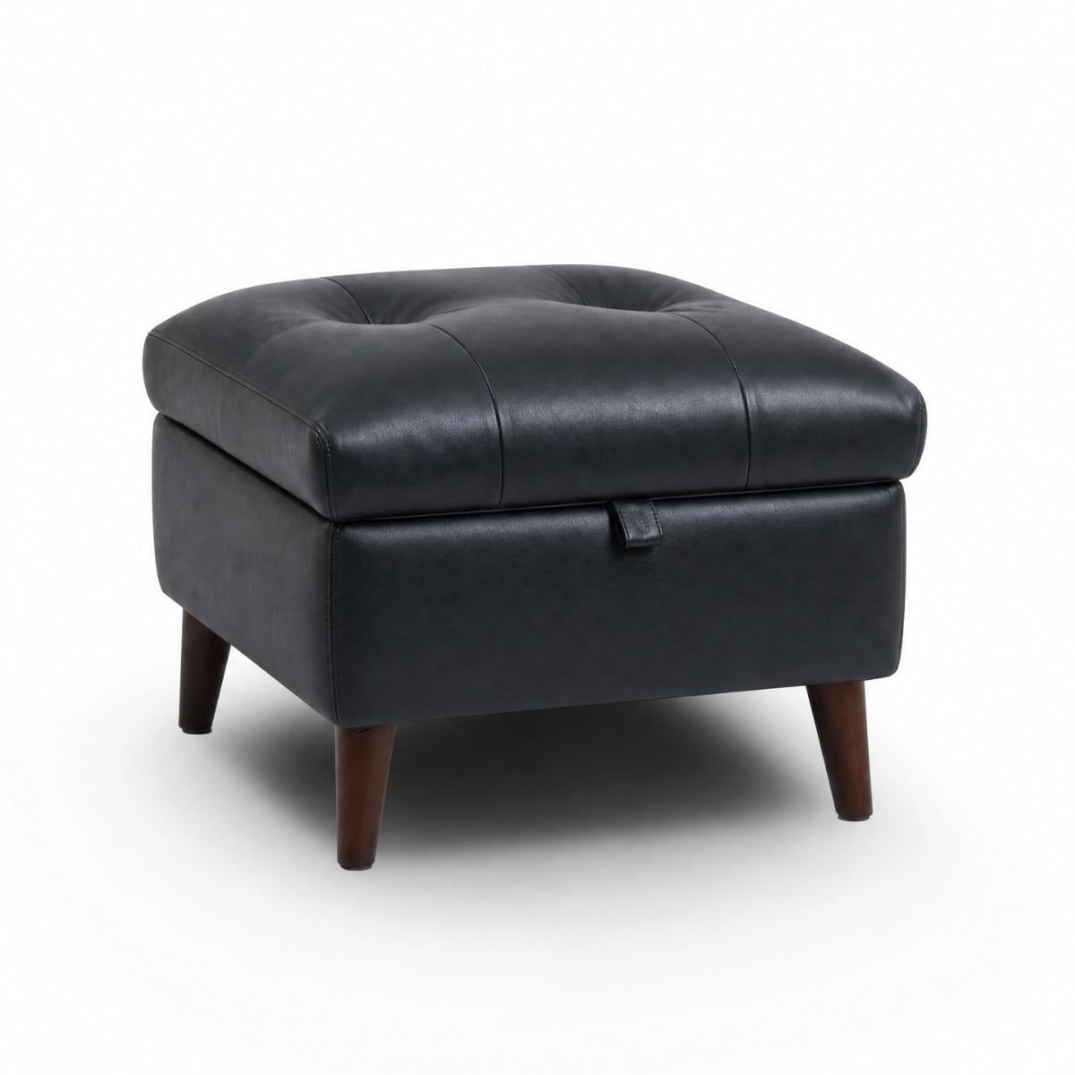 Manhattan black tufted storage ottoman with dark brown wooden legs, shown on a white background.