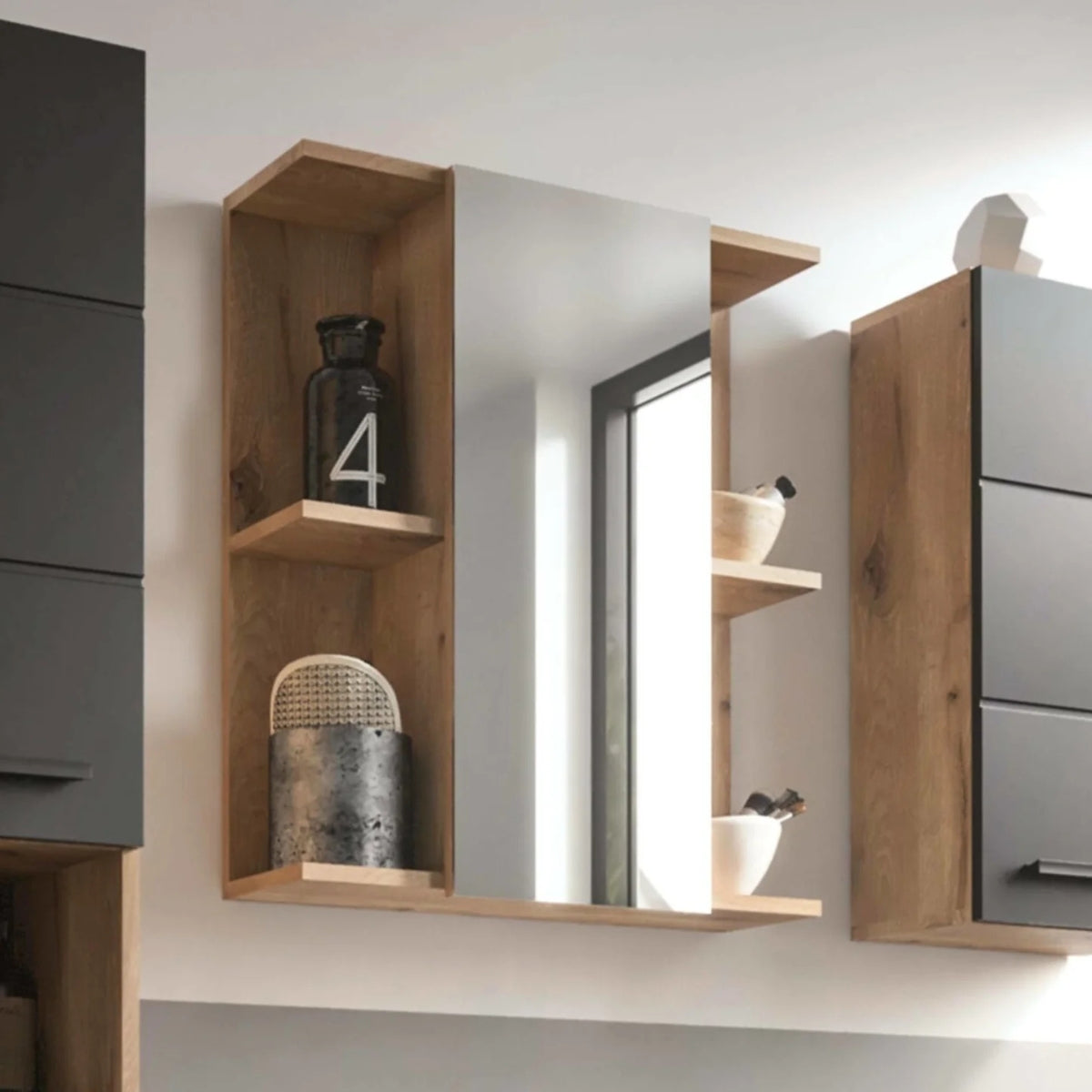 Modern bathroom setup with wooden shelves, mirror, and cabinets.