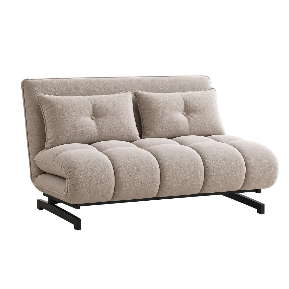 A modern compact futon sofa in a light beige textured fabric, featuring a low back, two matching tufted back cushions, a segmented bubble seat, and a black metal frame.