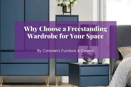 Blue freestanding wardrobe with gold legs.