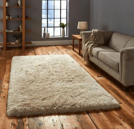 a circular rug in cream in bedroom