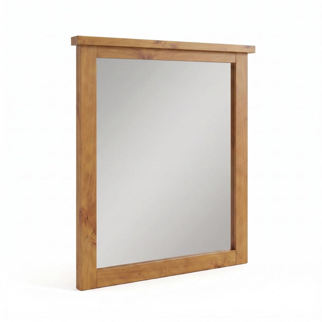 Ailbhe rectangularwall mirror with a thick, natural oak wood frame, shown at a slight angle on a white background.