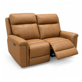 Ambrosia tan faux leather reclining loveseat with both seats extended, shown on a clean white background.