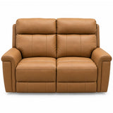 Ambrosia two-seater power reclining loveseat sofa upholstered in smooth tan faux leather, shown from a front-facing perspective against a solid white background.