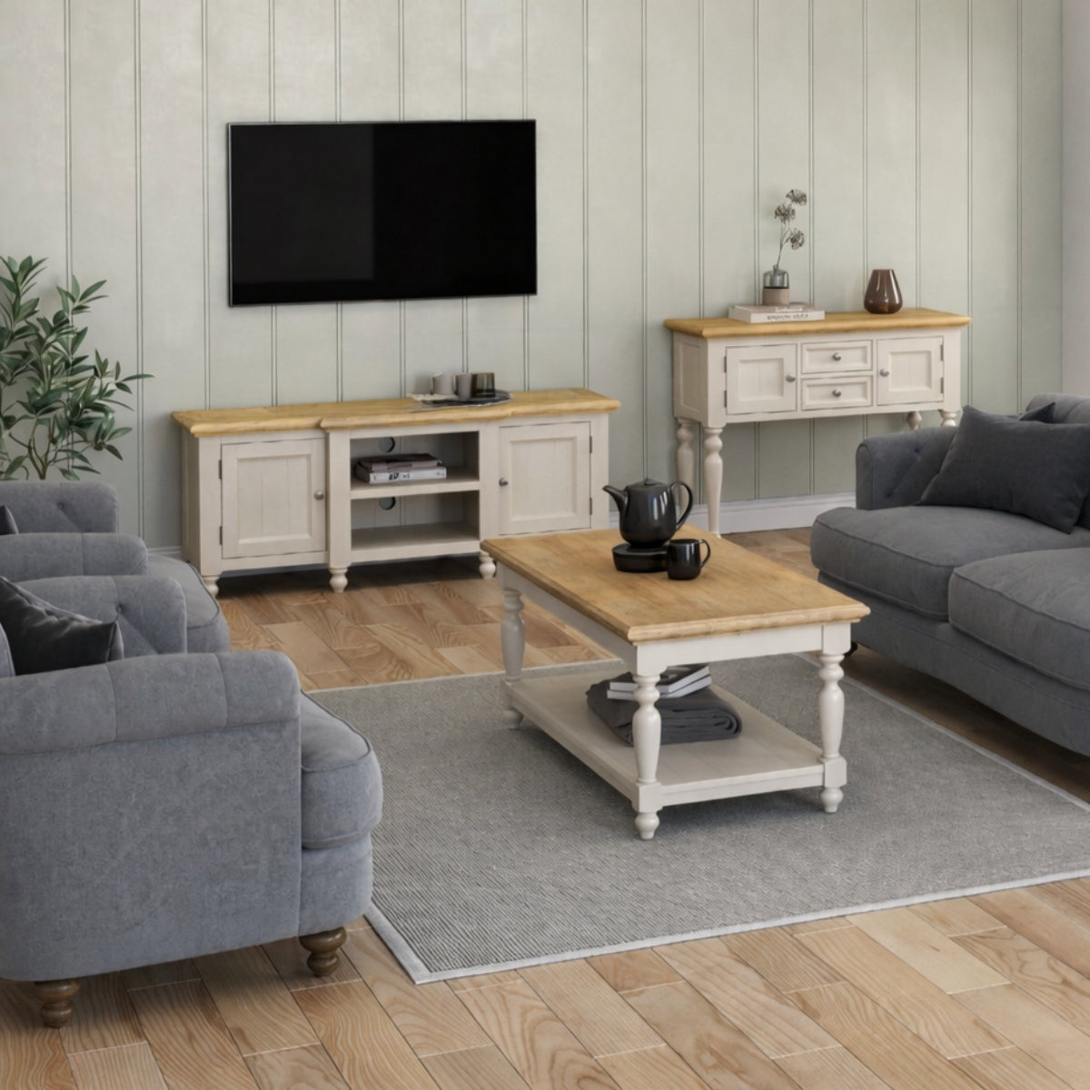 Living room with grey sofa, wooden coffee table, and TV stand.