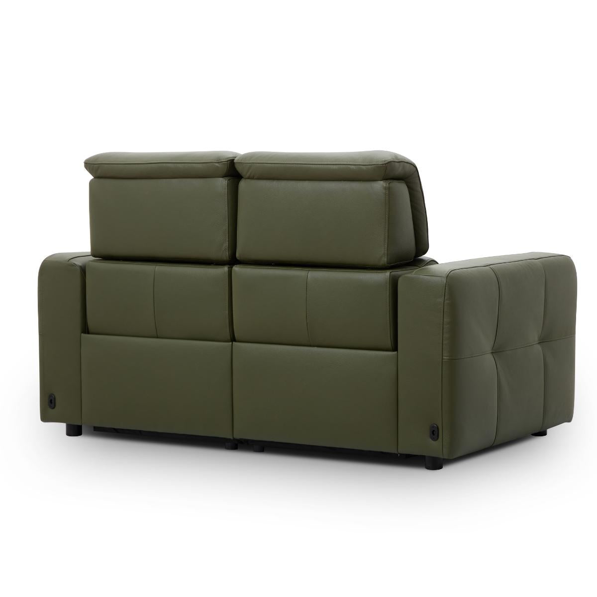 Carnegie green modular upholstered sofa with a high segmented backrest and tufted armrests, shown on a plain white background.