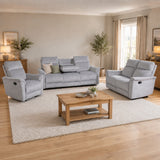 Living room with the Cindy grey sofa set and wooden coffee table.