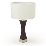 Table lamp with a white shade and brown base on a white background