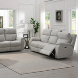 Hector grey upholstered reclining 3 seater and matching 2 seater in a bright, modern living room with white walls, large windows, and a neutral area rug.