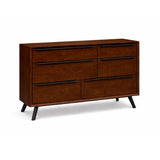 Mid century modern wide chest of drawers on a white background