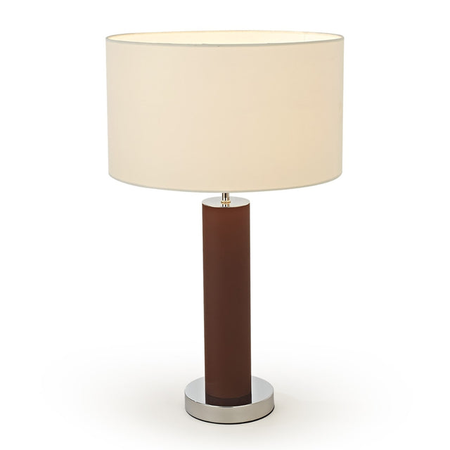 Table lamp with a brown cylindrical base and white shade on a white background