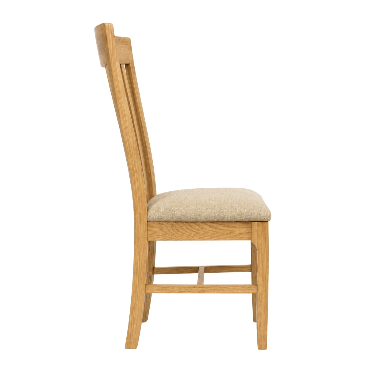 Maldon wooden dining chair with a light oak frame and a beige upholstered seat cushion, shown from a side profile view against a plain white background.