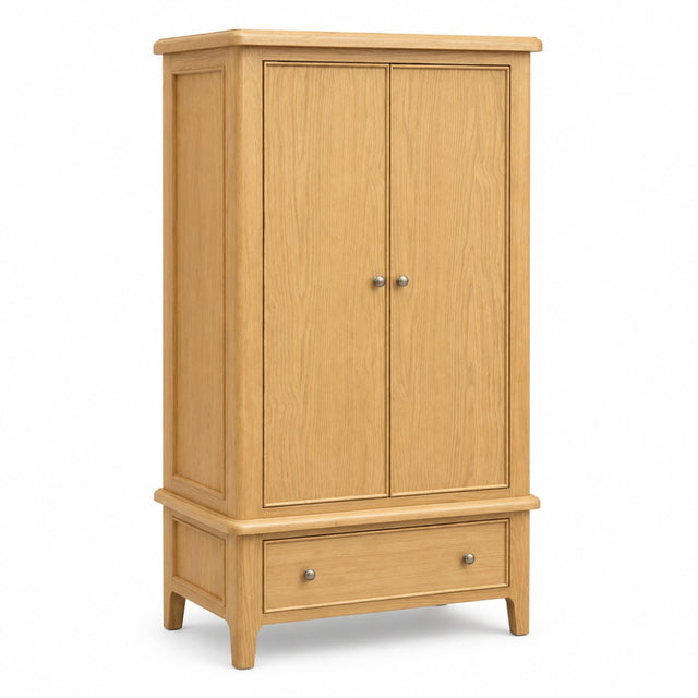 Maldon wooden double-door cabinet with a single drawer base, finished in a light natural oak finish with small round metal knobs, shown on a plain white background.
