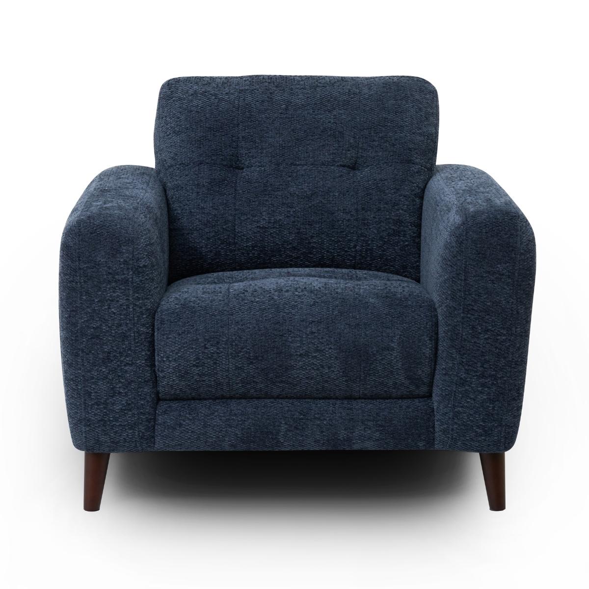Manhattan upholstered armchair in dark blue textured fabric with tufted back cushions and tapered dark wood legs, shown on a plain white background.