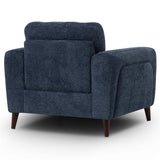 Manhattan armchair upholstered in textured navy blue fabric, featuring dark brown wooden legs, shown from a three-quarter angle against a white background.