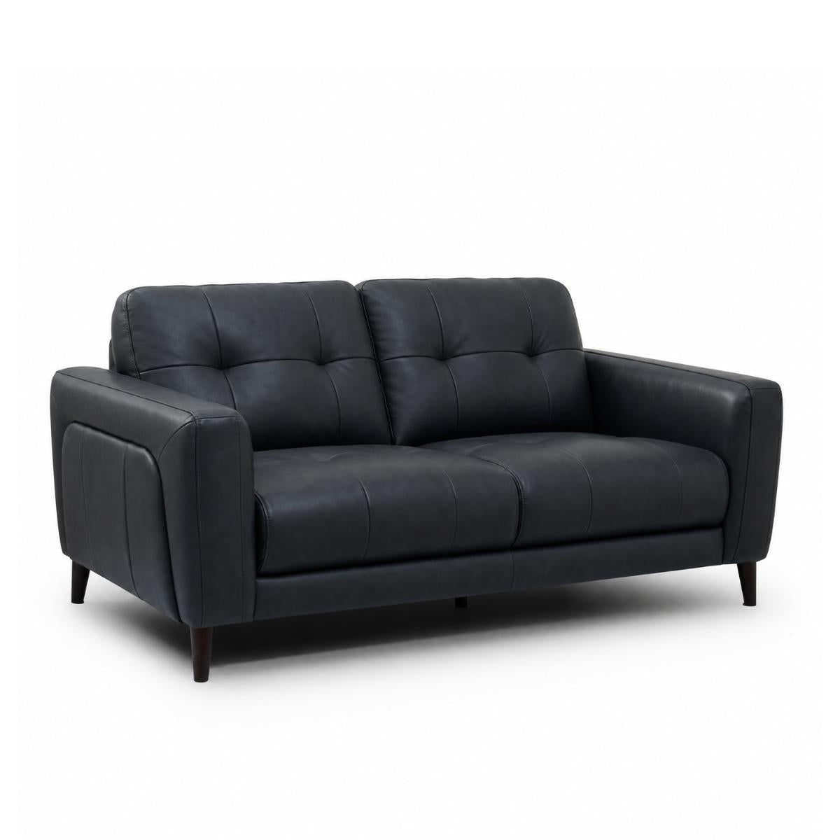 Manhattan modern 2.5 seater loveseat sofa upholstered in black leather, featuring tufted back cushions, wide armrests, and dark tapered legs, shown on a plain white background.