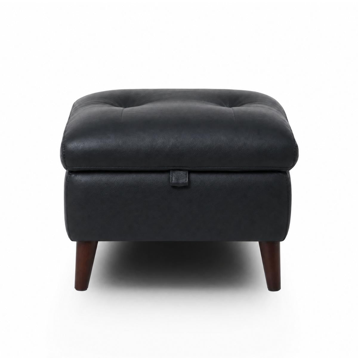 Manhattan black tufted storage ottoman with dark brown wooden legs, shown from a front-facing perspective on a white background.