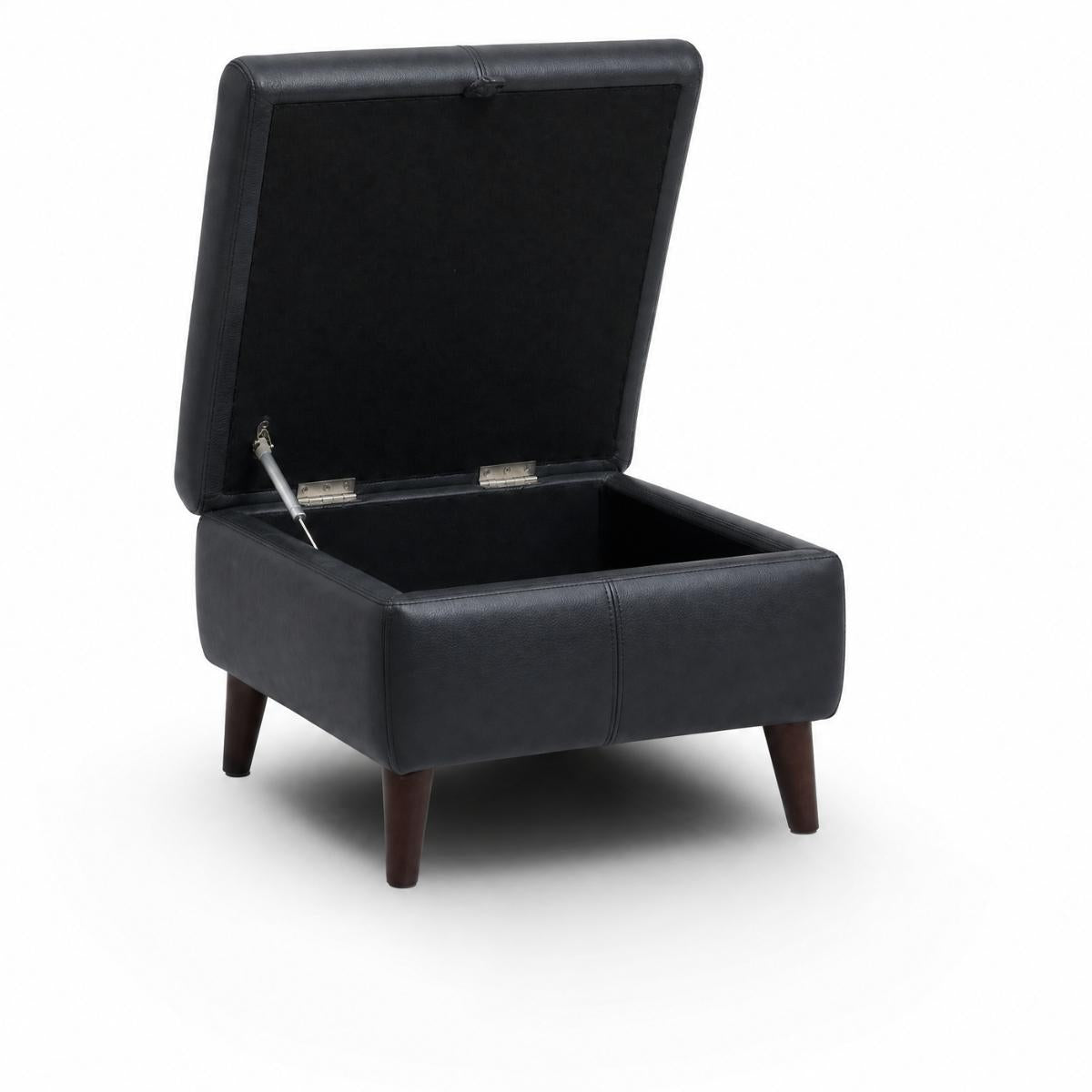 Manhattan black upholstered storage ottoman with a lift-up lid and dark wooden legs, shown open on a white background.