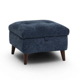 Manhattan square upholstered ottoman with a tufted top cushion, dark brown wooden legs, and a textured navy blue fabric, shown on a white background.