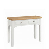 Mimosa white wooden dressing table with two drawers and a natural oak top, shown on a plain white background.