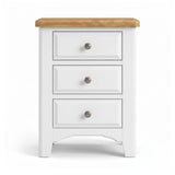 Mimosa three-drawer nightstand with a white painted body, a natural light wood top, and round metallic knobs, shown on a clean white background.