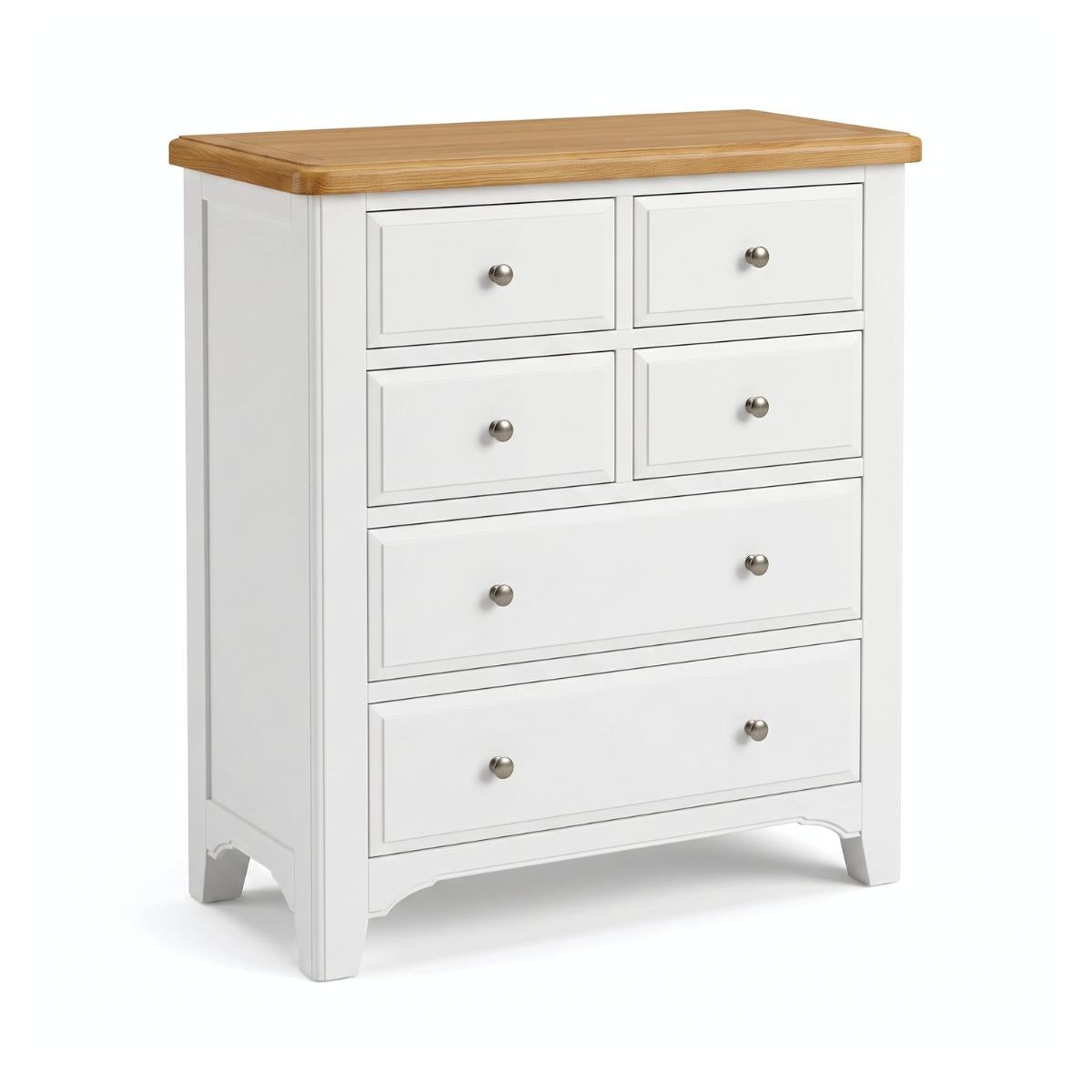 Mimosa white six-drawer chest of drawers with a natural light wood top and small round silver knobs, shown on a clean white background.