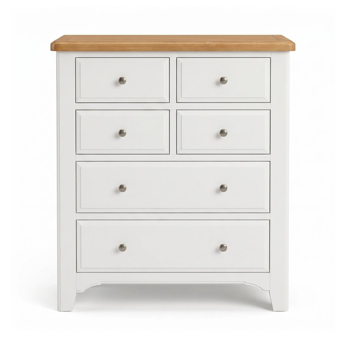 Mimosa white six-drawer chest of drawers with a natural light wood top and small round silver knobs, shown against a plain white background.