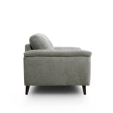 Odell grey upholstered armchair with dark tapered wooden legs, shown from a side profile view against a solid white background.