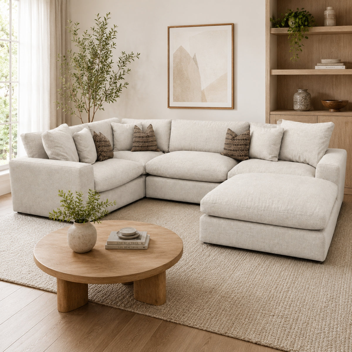 Modern living room with the Solara grey corner sofa, coffee table, and decorative elements.