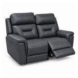 Solenne navy faux leather 2 seater sofa reclined. 
