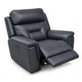 Solenne navy faux leather recliner chair with the footrest extended, shown from a three-quarter angle on a white background.
