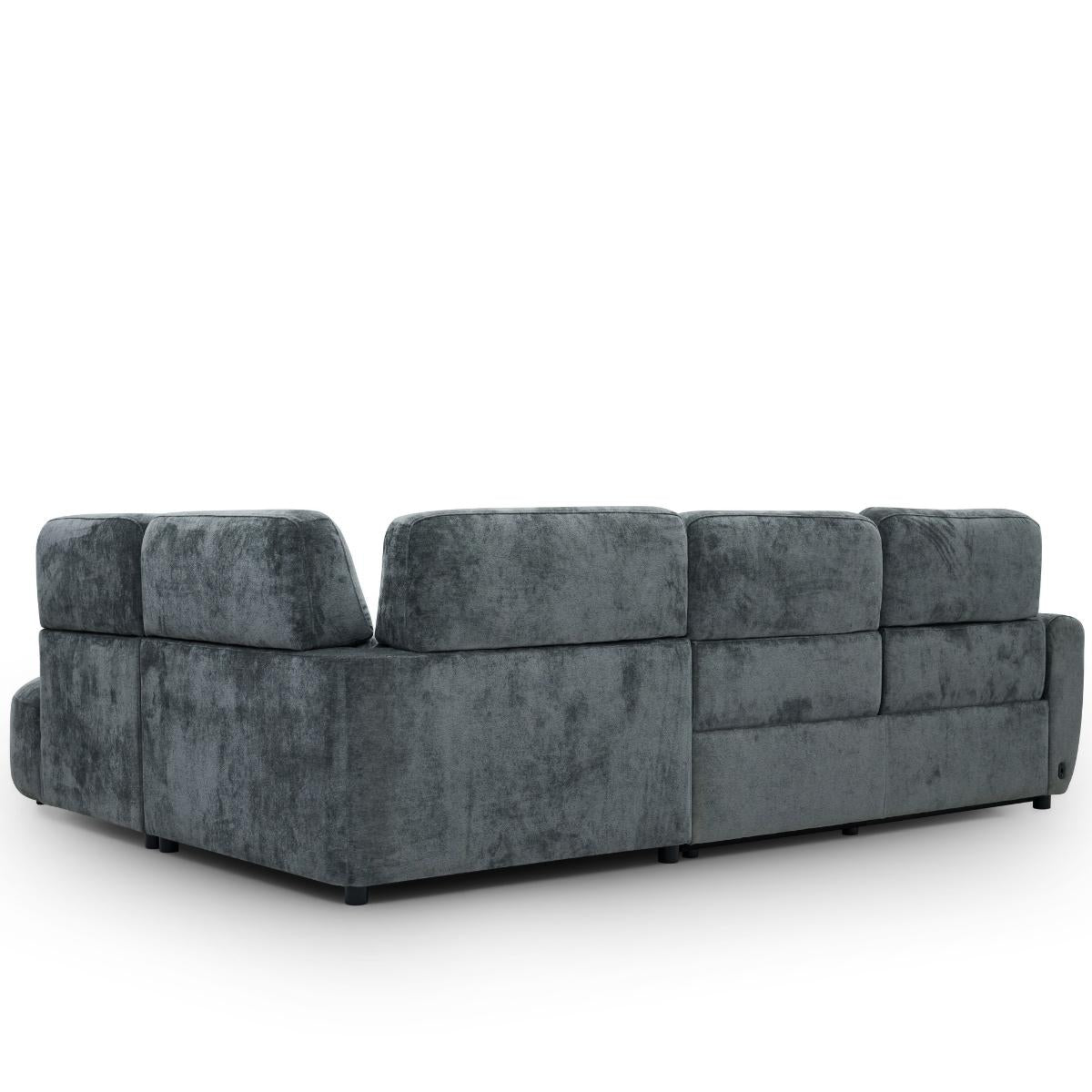 Trinity corner sofa upholstered in a textured, velvety medium charcoal fabric, shown from a three-quarter angle against a plain white background.