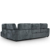 Trinity corner sofa upholstered in a textured, velvety medium charcoal fabric, shown from a three-quarter angle against a plain white background.