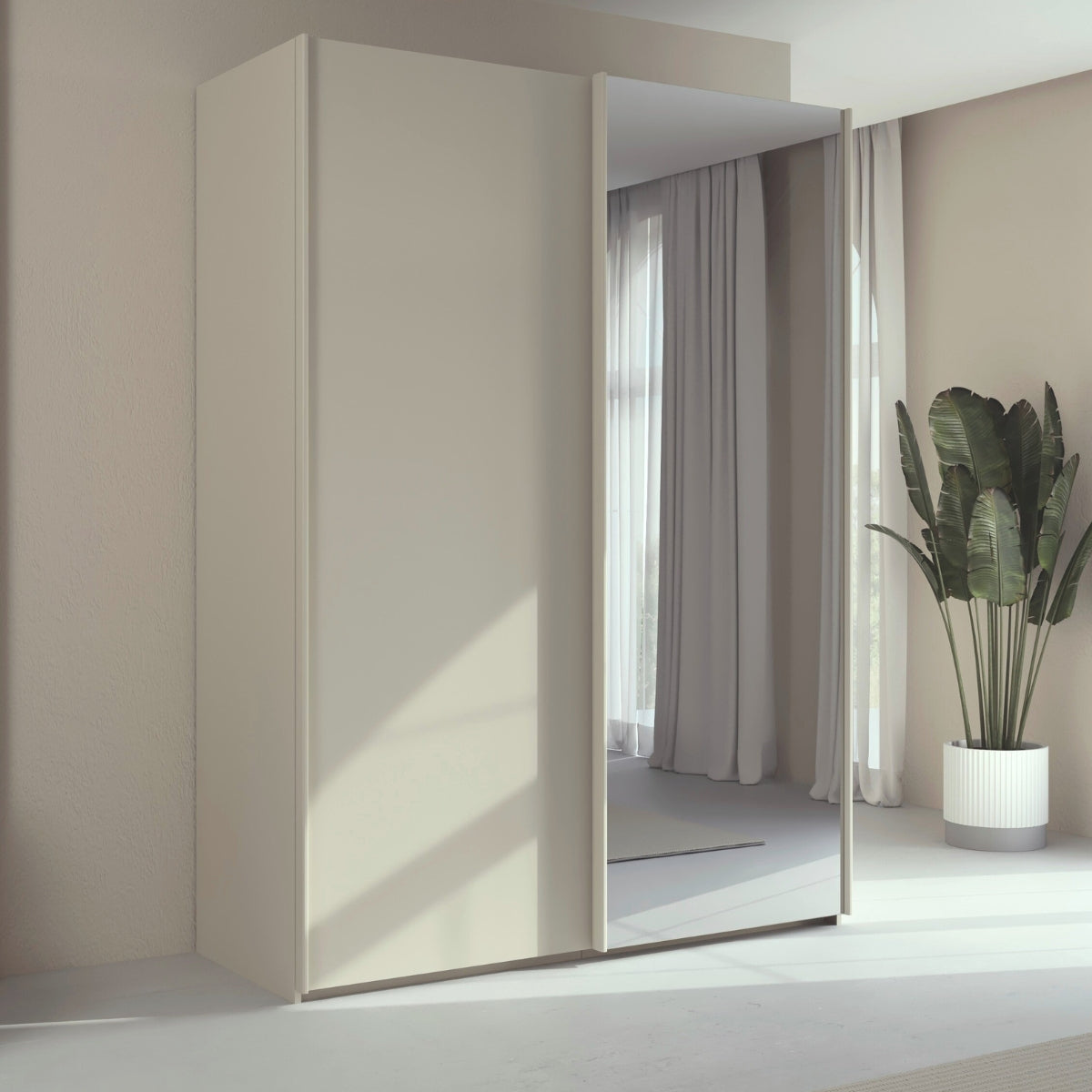 Trixie beige wardrobe with a mirror in a room with curtains and a plant.