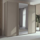 Trixie grey slide robe with sliding mirror door in a room with curtains and a plant.