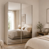 Trixie modern bedroom with a mirrored wardrobe and neutral decor