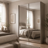 Modern bedroom with the Trixie mirrored wardrobe and neutral decor