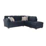 A dark navy blue sectional sofa with a chaise lounge on the right side, styled with four throw pillows in light beige and white, set against a plain white background.
