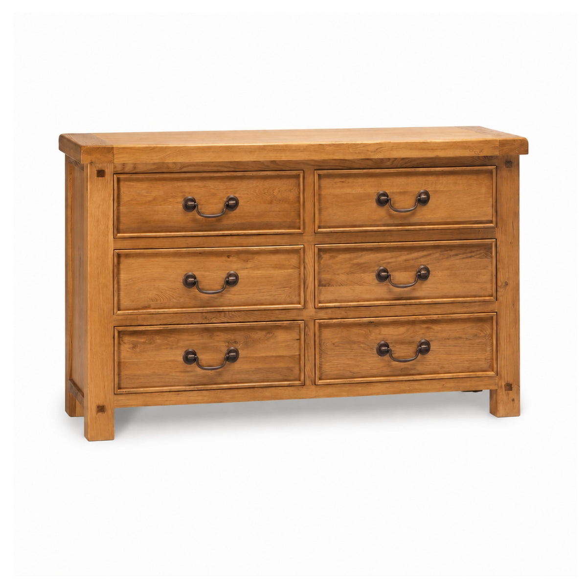 Wilma six-drawer wooden dresser with a warm medium-brown finish and dark metal drawer pulls, shown on a plain white background.