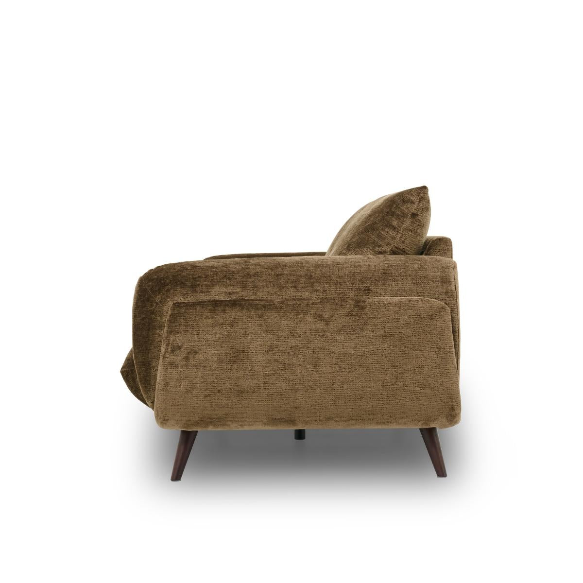 Zora brown velvet armchair with dark wooden legs, shown from a side-rear angle against a plain white background.