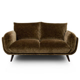 Zora modern two-seater loveseat sofa upholstered in a textured brown velvet fabric, featuring dark tapered wooden legs, shown against a plain white background.