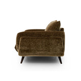 Zora mid-century modern armchair upholstered in a textured brown velvet fabric, shown from a rear three-quarter angle on a clean white background.