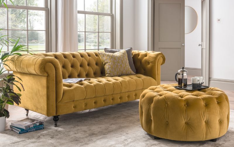 18th Century mustard velvet chesterfield sofa with matching velvet ottoman.
