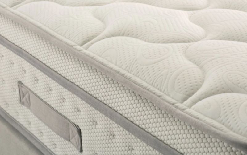 Bare quilted mattress.