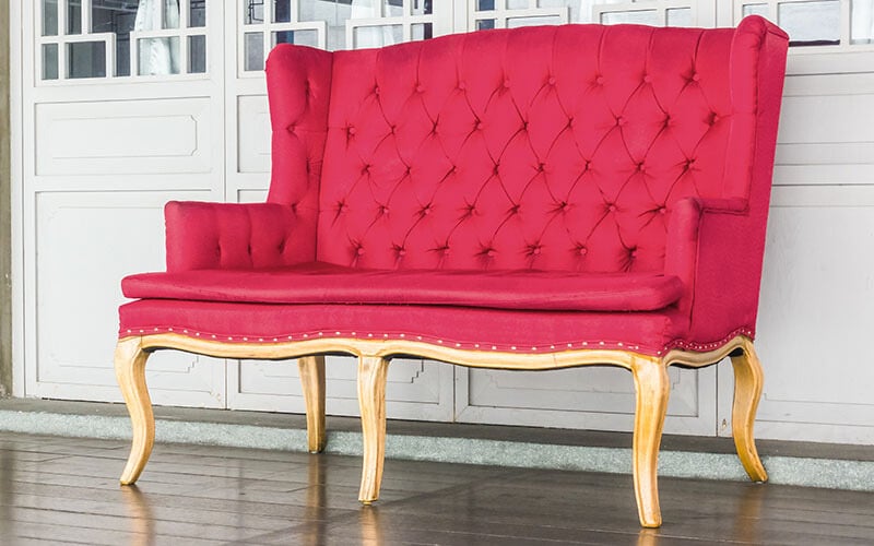 Classic red loveseat.