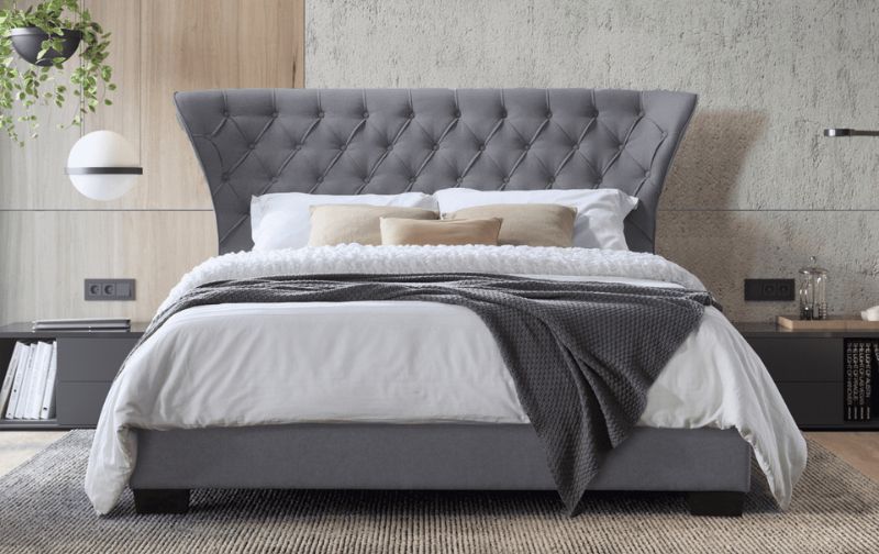 Grey tufted velvet headboard bed base and headboard.